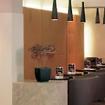إن إتش سيتي فندق 4*